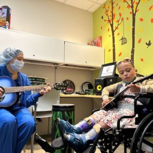 MHHP Music Room Shriners Hospital patient & music therapist 6 - 2_16_23